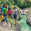Hikers near Soca river canyon